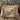 Couple holding the personalized Magnolia Rain woven blanket