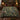 Mallard Reed Hollow botanical woven blanket spread across a bed