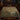 Mallard Reed Hollow botanical woven blanket spread across a bed