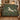 Personalized Millefleur Unicorn woven blanket styled in a home setting