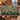 Mistletoe Poplars woven blanket draped over a sofa or armchair