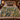 Mistletoe Poplars botanical woven blanket spread across a bed