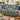 Morning Glory Trellis Lane woven blanket draped over a sofa or armchair