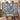 Couple holding the personalized Morning Glory Trellis Lane woven blanket