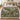 Moss Canopy botanical woven blanket spread across a bed