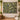 Moss Canopy botanical woven blanket shown without a name as a wall tapestry