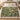 Moss Canopy botanical woven blanket spread across a bed