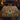 Nasturtium Potager Steps botanical woven blanket spread across a bed