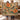 Couple holding the personalized Nasturtium Potager Steps woven blanket
