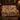 Nasturtium Potager Steps woven blanket draped over a sofa or armchair
