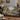 Peacock Boxwood Terrace woven blanket draped over a sofa or armchair