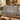Pear Orchard Thieves woven blanket draped over a sofa or armchair