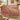 Pomegranate Hoopoes woven blanket draped over a sofa or armchair
