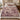 Rowan Waxwings botanical woven blanket spread across a bed