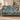 Couple holding the personalized Sea Holly Branching Field woven blanket