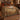Shepherds Oak botanical woven blanket spread across a bed