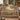 Skep Garden woven blanket draped over a sofa or armchair