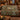 Stag Bracken Ford woven blanket draped over a sofa or armchair