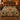 Sunflower Barn Quilt botanical woven blanket spread across a bed