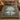Swan Moat Chateau botanical woven blanket spread across a bed