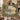 Couple holding the personalized Swan Moat Chateau woven blanket