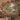 Couple holding the personalized Terracotta Garden River woven blanket