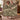 The Cardoon Bed botanical woven blanket shown without a name as a wall tapestry