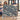 The Sea Holly Mound botanical woven blanket shown without a name as a wall tapestry