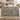 Thistle Copse botanical woven blanket spread across a bed