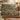 Thistle Copse woven blanket draped over a sofa or armchair