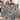 Couple holding the personalized Thistle Copse woven blanket