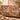Toadstool Fox Forest Floor woven blanket draped over a sofa or armchair
