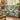 Trillium Waterfall Glen woven blanket draped over a sofa or armchair