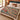 Tulip Rill botanical woven blanket spread across a bed
