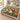 Tulip Rill botanical woven blanket spread across a bed