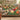 Tulip Rill woven blanket draped over a sofa or armchair