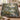 Twin Heron Reed Bend woven blanket draped over a sofa or armchair