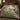 Twin Heron Reed Bend botanical woven blanket spread across a bed