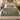 Walnut Shade botanical woven blanket spread across a bed