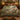 Willow Stream Foxglove botanical woven blanket spread across a bed