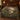 Wood Duck Cypress Lake Dawn botanical woven blanket spread across a bed