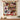 Personalized poinsettia Christmas photo blanket with seven family photos displayed on a wall