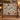 Poinsettia Deer & Cardinal Christmas woven blanket displayed in a cozy room