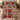 Poinsettia Legend Patchwork quilt bedding set with 2 matching pillowcases on a bed in a festive bedroom