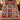 Personalized Poinsettia Legend Patchwork quilt bedding set with custom family name and 2 matching pillowcases on a bed
