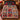 Poinsettia Legend Patchwork woven blanket with custom family name spread on a bed