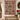 Poinsettia vase woven blanket displayed as a Christmas wall tapestry