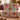 Poinsettia vase woven blanket draped over a sofa
