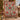 Poinsettia vase woven blanket draped over an armchair