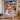 Polar Bear Garland family photo fleece throw displayed on a wall above a bench